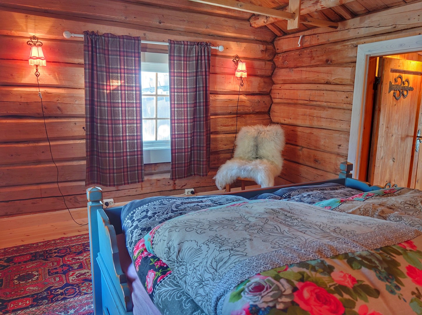 Romantic bedroom in a log cabin